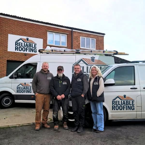 Leonard and team of Reliable Roofing with company van